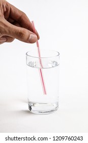 Hand Putting Drinking Straw Into Glass Stock Photo 1209760243 ...