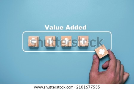 Hand putting plus sign which use download style which mean value added , positive thinking and personal development concept. Foto stock © 