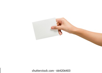 Hand putting a voting ballot isolated on white background