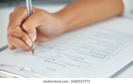 Hand, questionnaire and writing with pen in office, confidential paperwork and medical history or agreement. Health insurance, information and person checklist for prescription, clinic and referral - Powered by Shutterstock