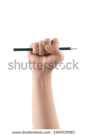 hand raised fist with pencil isolated on white background.