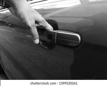 Hand Reaching Car Door Handle Close Up Black And White