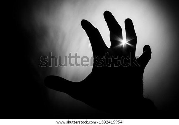 hand reaching for help to\
the light