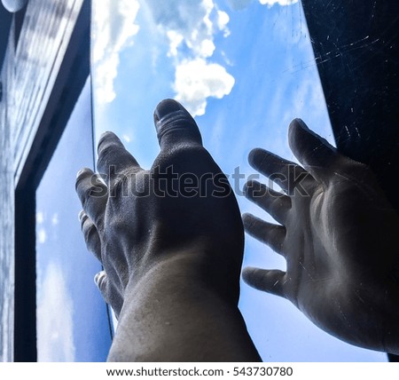 bare foot at the window