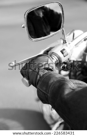 Similar – Couple sitting over motorcycle ready to go