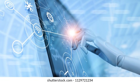 
 Hand of robot using over the interface virtual screen to check status and control automation robotics arms machine in intelligent factory industrial with icon flow and data exchange in manufacturing - Shutterstock ID 1129721234