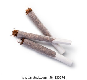 Hand rolled cigarettes on a white