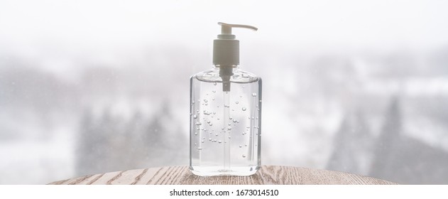 Hand sanitizer bottle on banner header background for COVID-19 Coronavirus concept. - Shutterstock ID 1673014510