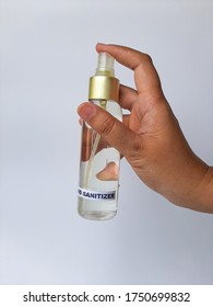 Hand Sanitizer In A Clear Spray Bottle. Isolated In White Background