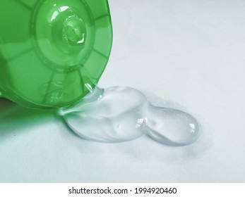 Hand Sanitizer Gel Flows From A Tube On A White Background