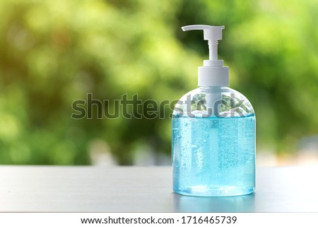 hand sanitizer gel for hand hygiene on green background, health care concept.corona virus protection.