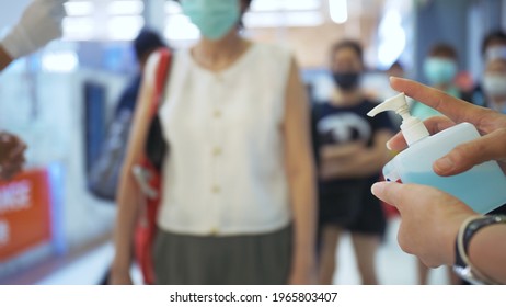 Hand Sanitizer Gel. Hand Treatment With Alcohol. Temperature Check At Supermarket, Grocery Store With A Thermal Imaging Camera Installed.