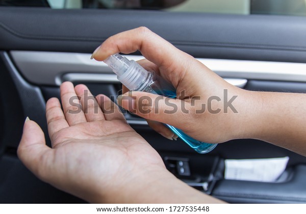 Hand sanitizer prevent virus\
and plague infection, prevent covid-19 virus, picture in the\
car
