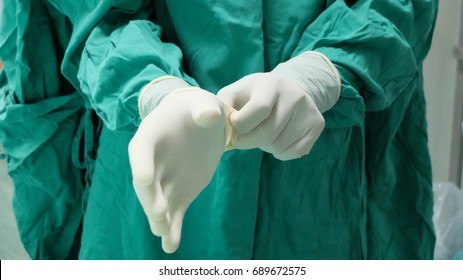 Hand Scrubbing and wearing a Surgical Gloves before starting the operation, Step by step procedures.
