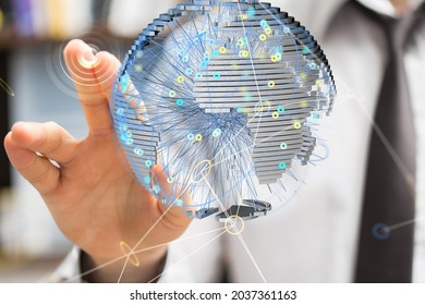A hand selecting a render of a circular world sphere- global network connection concept