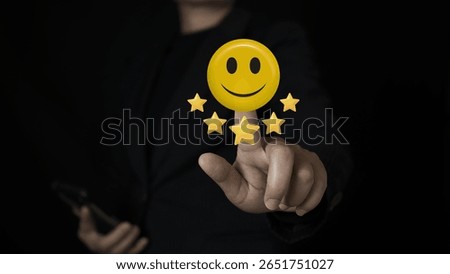businessman’s hand selects a smiling face representing customer service excellence, 5-star business ratings, and positive customer experience in satisfaction surveys.of a satisfaction survey strategy.