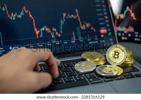 hand sell or buy a coin Cryptocurrency on laptop. Bitcoin on chart background. Virtual cryptocurrency concept. digital for defi decentralized financial banking p2p exchange investment technology