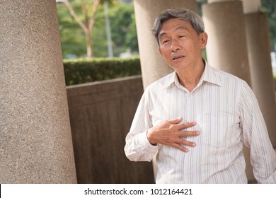 Hand Of Senior Old Man Holding Acid Reflux, Esophagus Cancer Chest