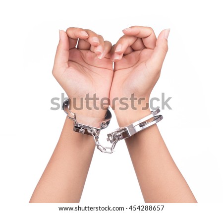 hand in shackle isolated on white background
