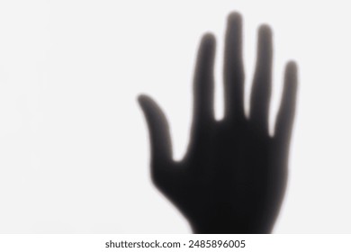 Hand shadow reflection on the wall