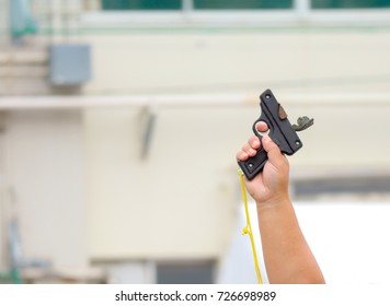 A Hand Shooting A Gun  For Starting Race.