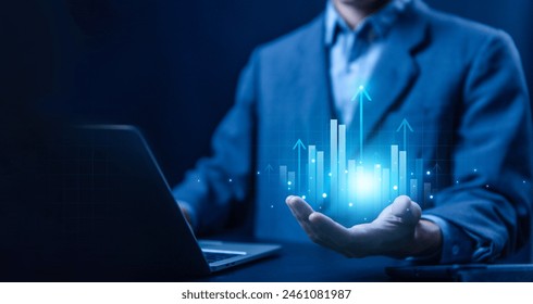 hand show graph chart stock market economic. growth business concept. plan strategy company increase profit to success global. trend marketing grows technology digital. economy, financial, and invest - Powered by Shutterstock