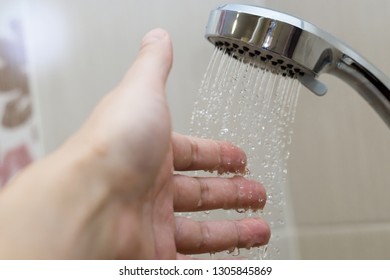 Hand In The Shower Test Water Temperature