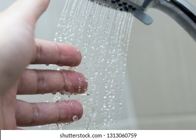 Hand In The Shower Test Water Temperature