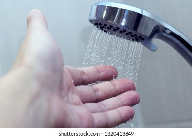 Hand In The Shower Test Water Temperature