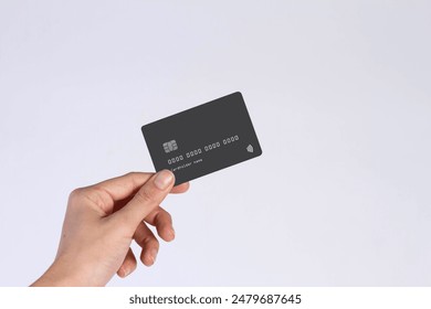 Hand showing credit card, or card, or business card or voucher, isolated on white background, template, mock-up - Powered by Shutterstock