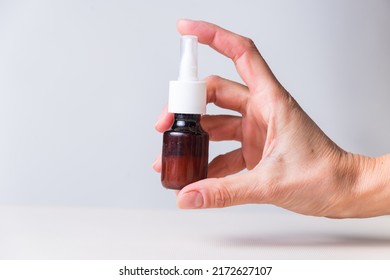 Hand Showing Ear Fluid, Vertical, Pandemic, Health And Wellness Concept, Selective Focus