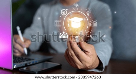 Hand showing graduation hat icon in light bulb. Internet education course degree and study knowledge. Creative thinking idea with goal, laptop, friend. E-learning graduate certificate program concept.