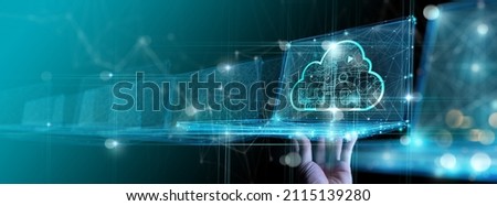 Hand showing laptop computer with cloud network Computer connects to internet server service for cloud data transfer.Cloud computing technology and online data storage for business network concept. 