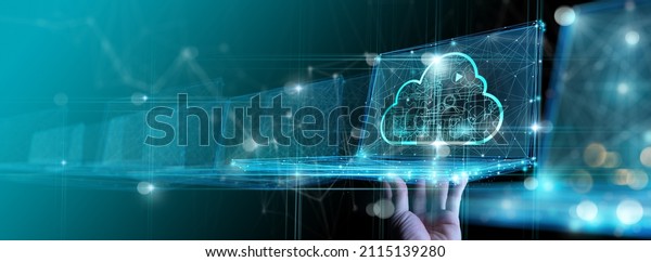 Hand showing laptop computer with cloud network Computer\
connects to internet server service for cloud data transfer.Cloud\
computing technology and online data storage for business network\
concept. 