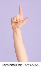 Hand Showing Letter L On Color Background. Sign Language Alphabet