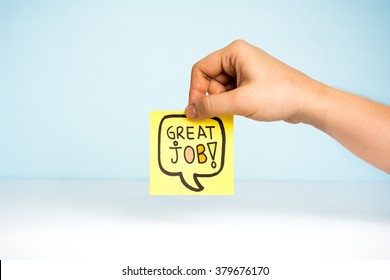 Hand Showing A Note With Great Job. Postit Great Job Boss Team Photography Concept.