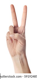 Hand Showing The Sign Of Victory And Peace. Close Up Of Female Hand Showing Victory Sign Isolated On White Background. Woman Hand Gesturing Peace Sign.