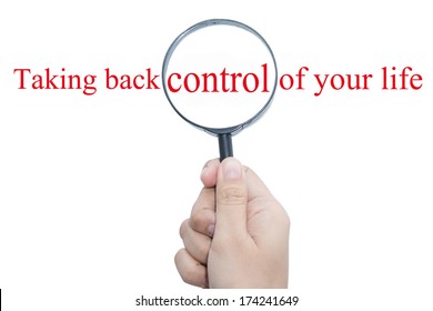 Hand Showing Taking Back Control Of Your Life Word Through Magnifying Glass  