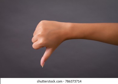 Hand Showing Thumb Down, Dislike, Bad, Disapproval, Unacceptance, Not Okay, Not Ok, Negative Gesture