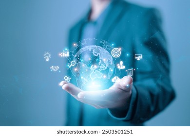 hand shows the globe of digital marketing. concept business tech international market. global internet connection big data digital link business technology. Financial, internet banking - Powered by Shutterstock