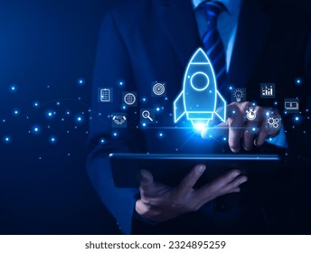 The hand shows a rocket. Concept of Startup Business, Entrepreneurship Idea, and Online Digital Business. network connection on the interface Marketing, Technology, and Success - Powered by Shutterstock