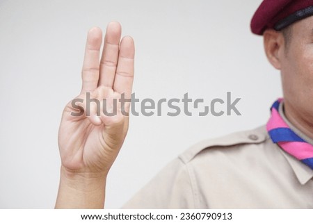Hand sign code of scout. Concept, Scout activity that teaching in schools Thailand. Hand signs and symbols which meaningful in scouting lesson. Show hand sign for oath.                            