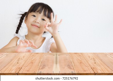 Hand Sign For O.K. From Asian Kid.