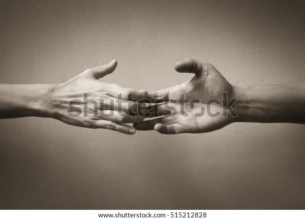 Hand sign\
of people letting go. Break up concept.\
