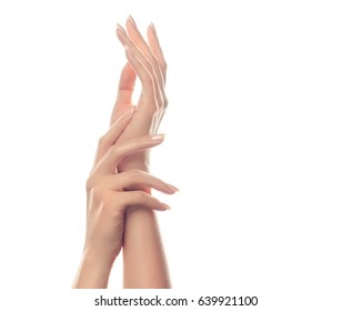 Hand Skin Care. Closeup Of Beautiful Woman Hands With  Light Manicure On Nails . Cream For Hands And Treatment.