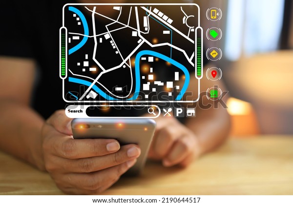 The hand of the\
smartphone finds the location on the map in order to guide you\
through the application.
