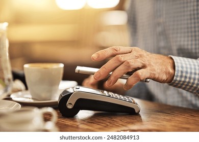 Hand, smartphone and pos terminal in restaurant for payment, purchase and fintech with mobile app. Cafe, senior customer and cellphone by machine for tap, nfc and digital transaction for service - Powered by Shutterstock