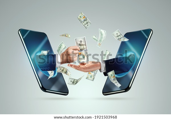 Hand\
from a smartphone transfers money to another hand. Online money\
transactions, mobile payments using a smartphone. Concept Financial\
growth, passive income, online business,\
dividends