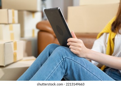 Hand Of SME Small Business Shop Owner Working On Digital Tablet Checking Customer Order. Online Store. Parcel Box Ready To Delivery. Social Media, E-commerce, Internet Shopping. Copy Space