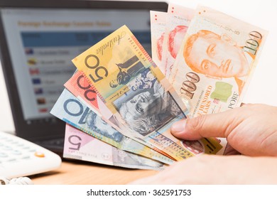 Hand Sorting Australian Dollar Singapore Dollar Stock Photo (Edit 362591753